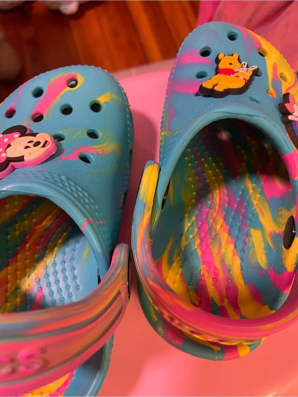 CROCS Kids Tie-Dye Blue Yellow Pink Slip-On Clogs with Character Charms